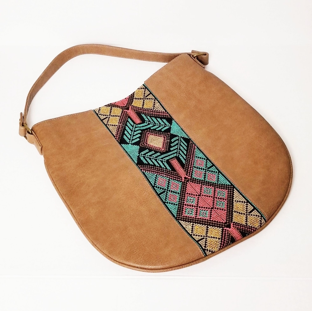 Aztec embossed tshirt and Jean's shoulder hobo bag